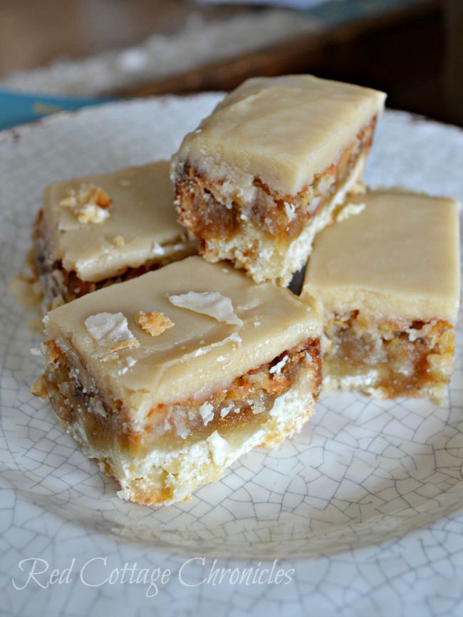 Coffee Frosted Squares stacked on a plate.