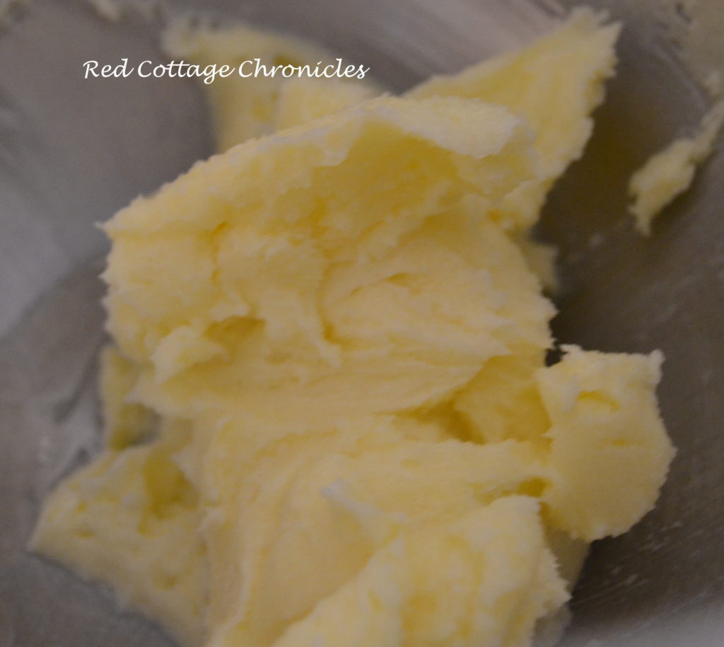 In the bowl of electric mixer fitted with paddle attachment cream 3/4 cup of the sugar and the butter.  Beat in egg yolks, one at a time.