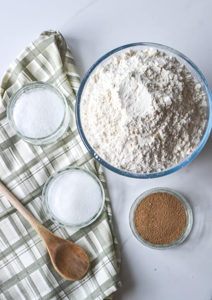 An overhead view of ingredients to make English Muffin Bread