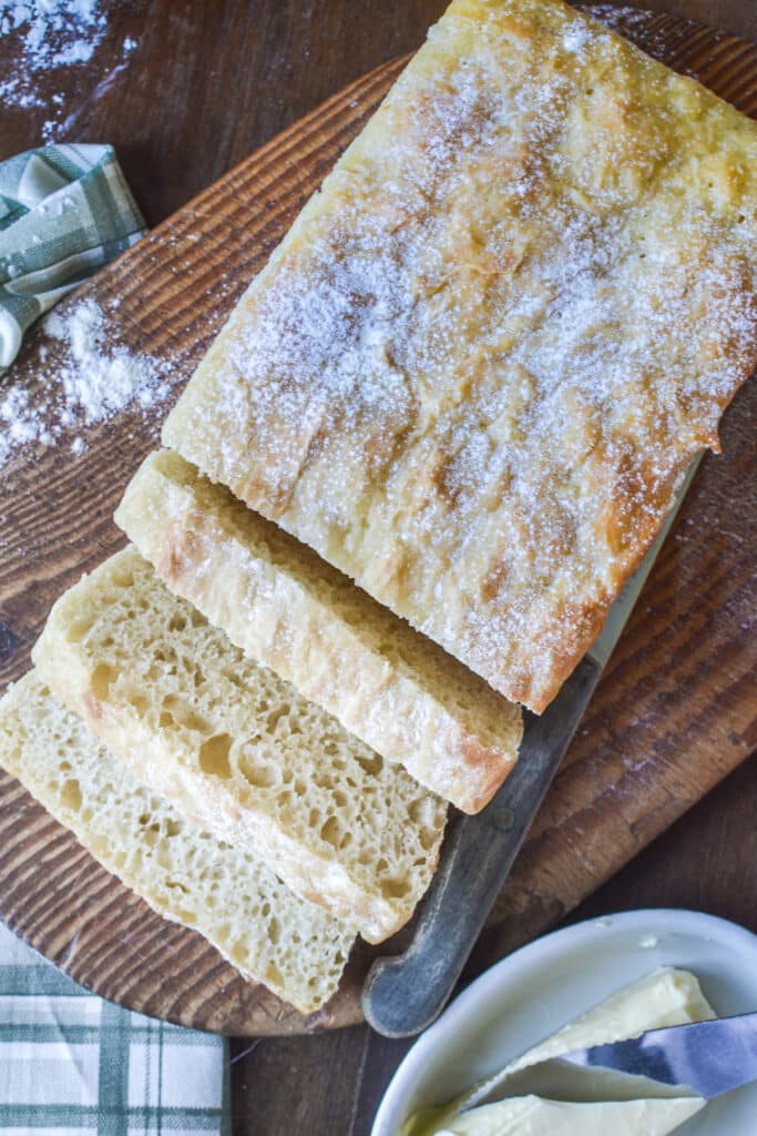 Overhead view of a slice fresh loaf of bread