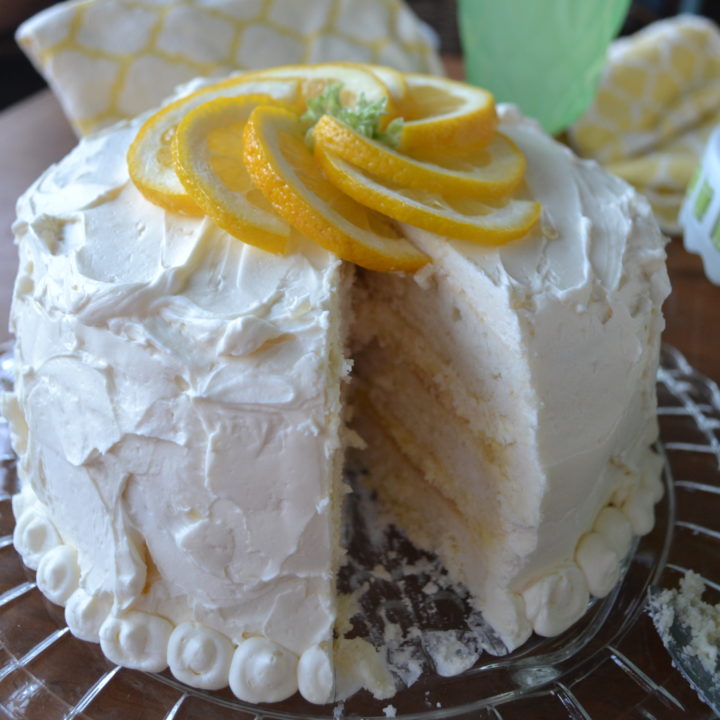 triple layer cake filled with lemon curd, whipped honey mascarpone filling and frosting with Swiss butter cream. Decorated with lemon slices