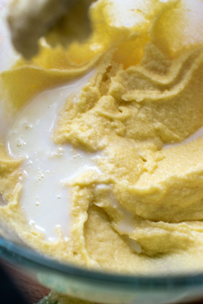 Buttermilk added to lemon cupcake batter.
