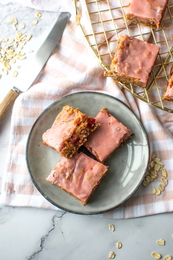 Cherry chews on a plate on top of a pink and white gingham towel.