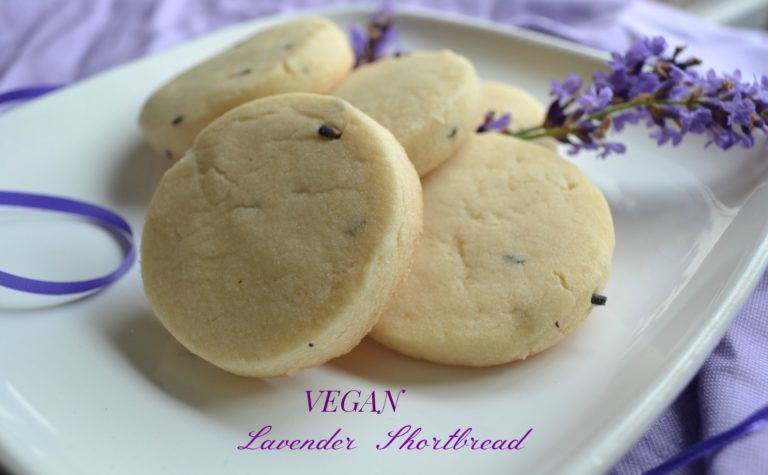 Vegan lavender shortboard cookies on a white plate.