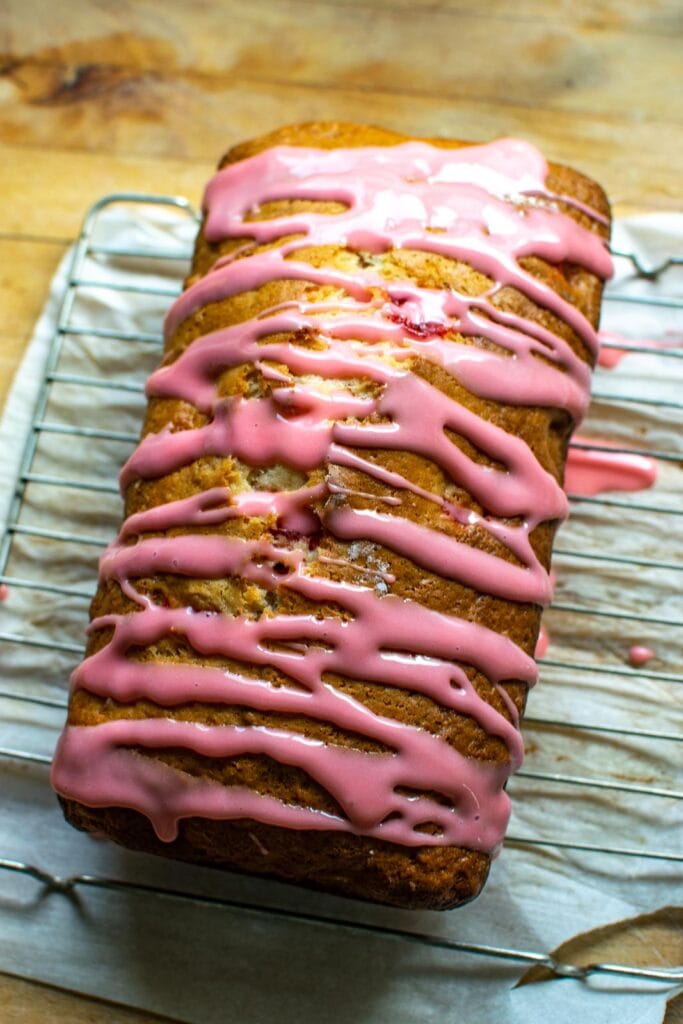 Cherry nut quick bread drizzled with a cherry flavoured glaze.