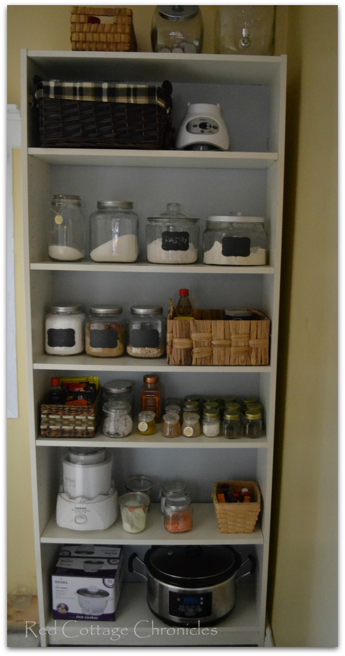 A re-purposed Ikea Billy Bookcase works as a pantry in a small space