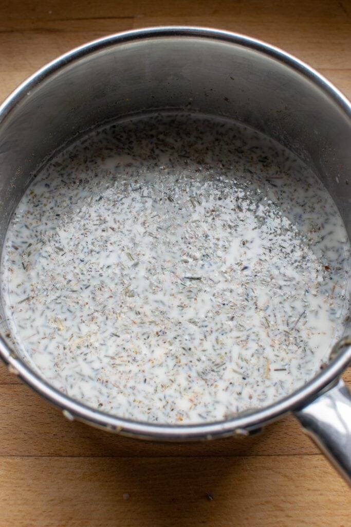 Lavender buds that have been steeped in milk for 4 to 5 minutes.