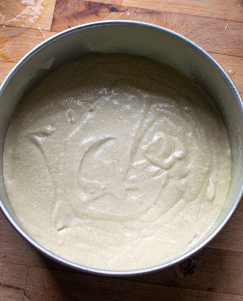 Batter for Vanilla Lavender Cake in an 8 inch round cake pan before baking.