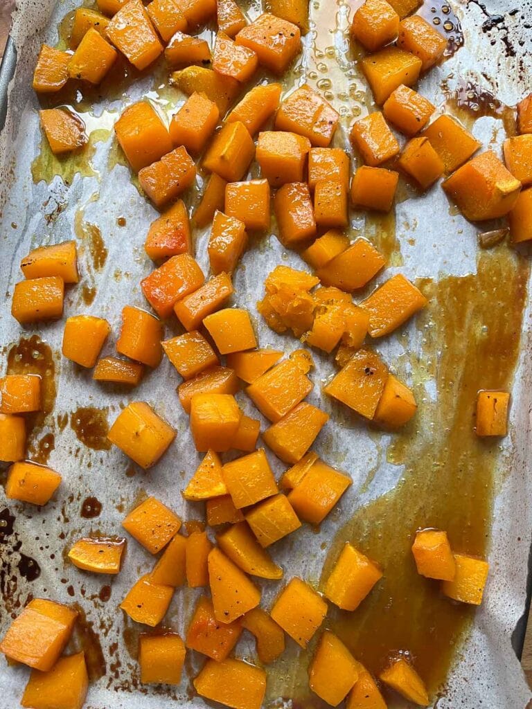 Roasted butternut squash with maple syrup and olive oil fresh out of the oven.