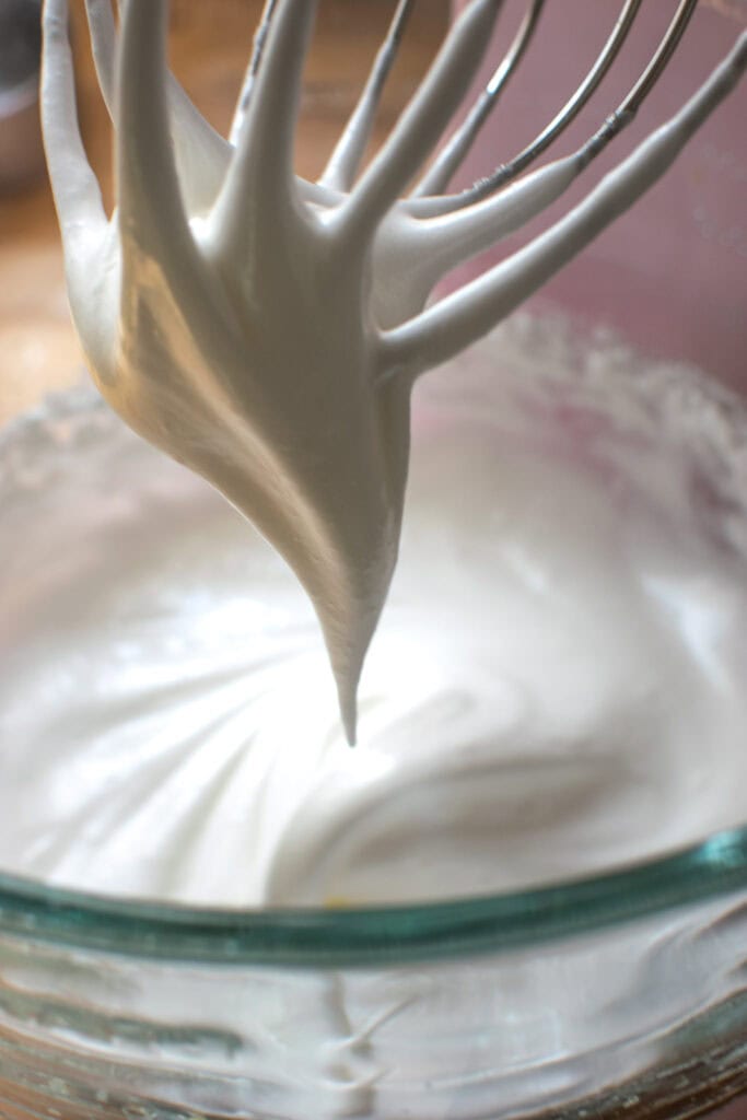 Egg whites, sugar and salt whipped in a stand mixer to stiff glossy peaks to make meringue