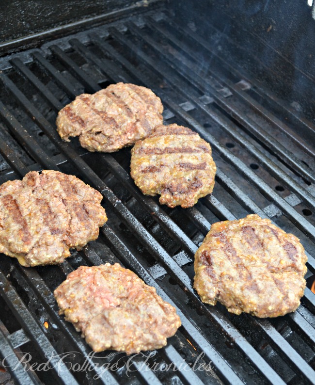 These buffalo wing burgers are smothered in chunky blue cheese and mild buffalo wing sauce