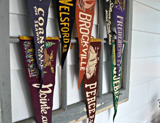 Thrift store decor vintage pennants display