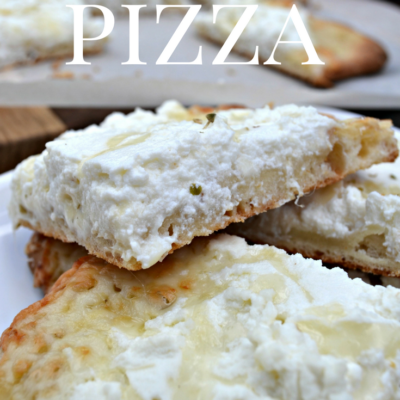 White Pizza made on flatbread with ricotta, mozzarella and drizzled with honey.