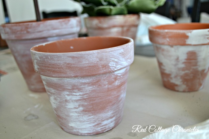 how to age a terracotta pot