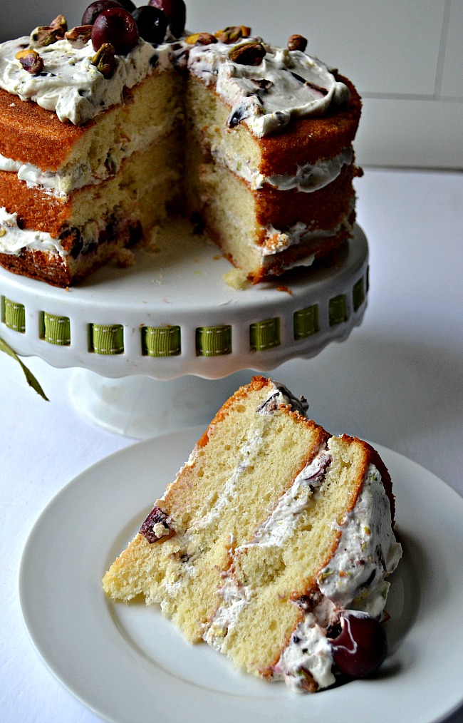 An easy naked cake stuffed with fresh sweet cherries, pistachios and cream