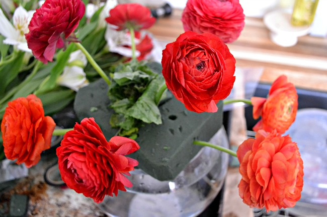 farmers market flower bouquets with red ranunculus and radishes