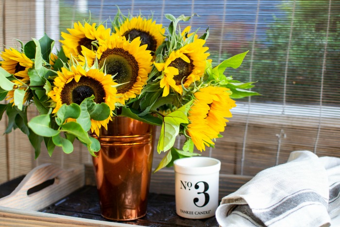 Using Copper to display sunflower arrangements