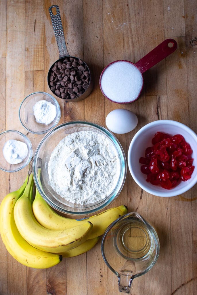 Ingredients to make banana cherry chocolate chip muffins.