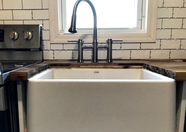 white farmhouse sink