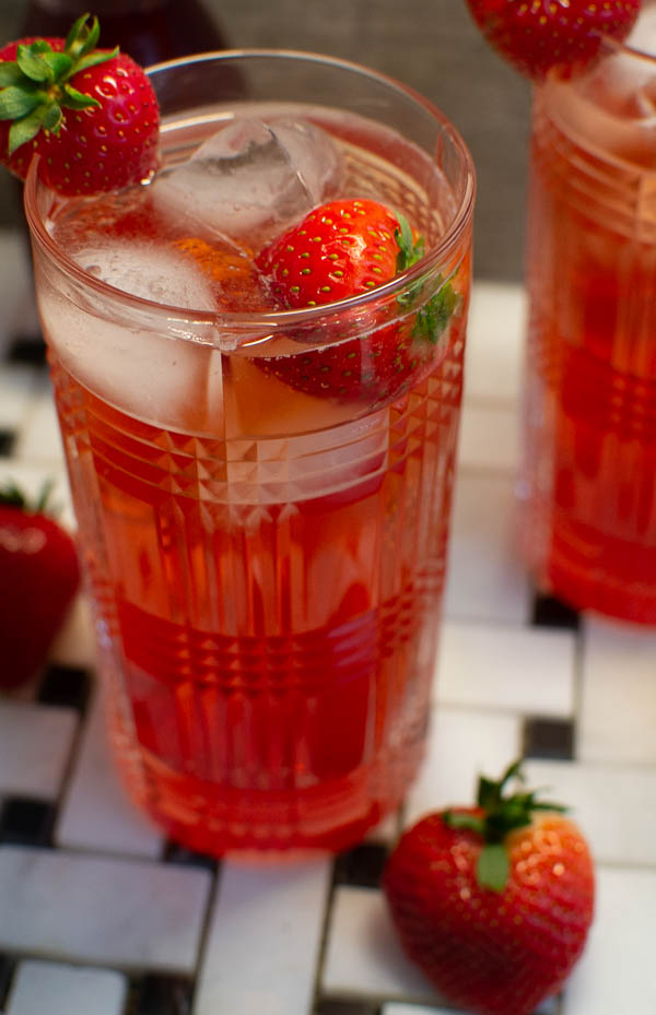 strawberry gin and tonic, a fruity twist on a classic cocktail