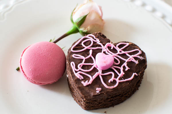 Homemade heart shaped brownies highlight this Valentine's Day table decor