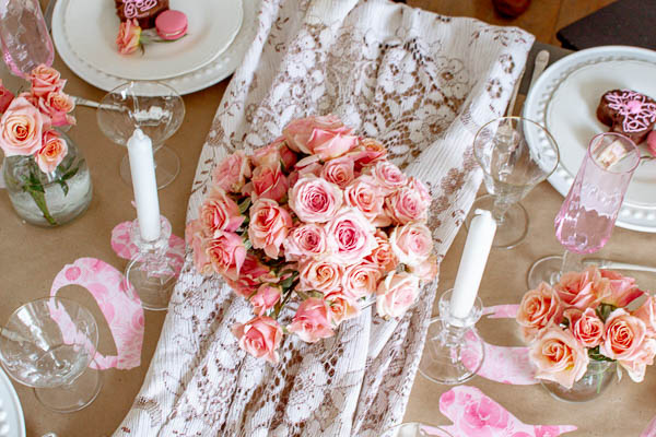 Vintage lace tablecloth highlights this Valentine's Day table decor