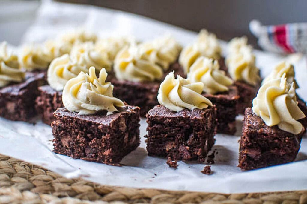 Mocha brownie squares with a swirl of coffee frosting.