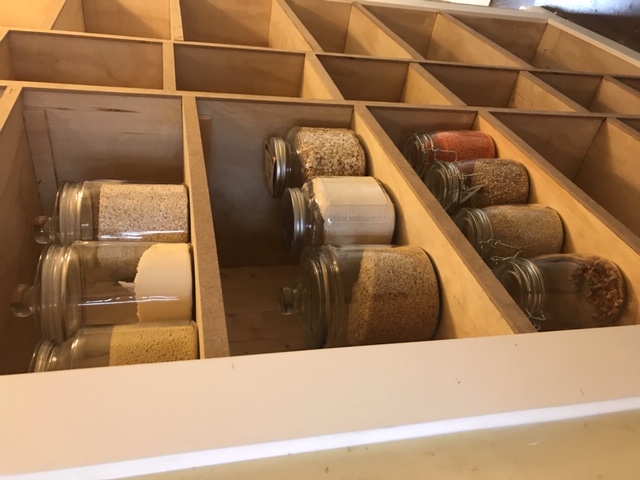 An unused coate closet becomes an open pantry off the kitchen