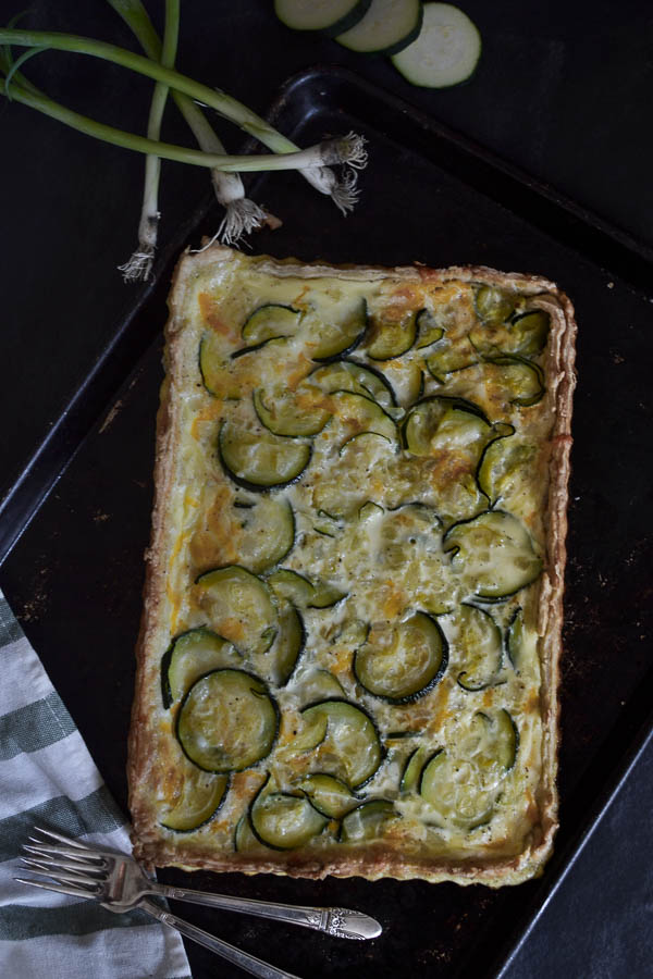 An easy cheesy zucchini quich recipe that is ready for the oven in under 15 minutes