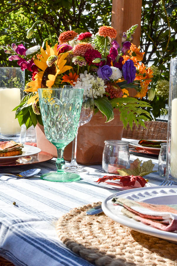 fall flower centerpiece in a clay pot