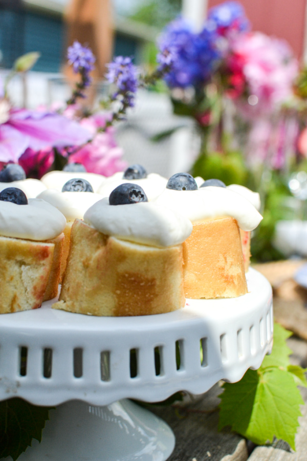 Rolled cake topped with whipped cream is a great summer dinner party idea