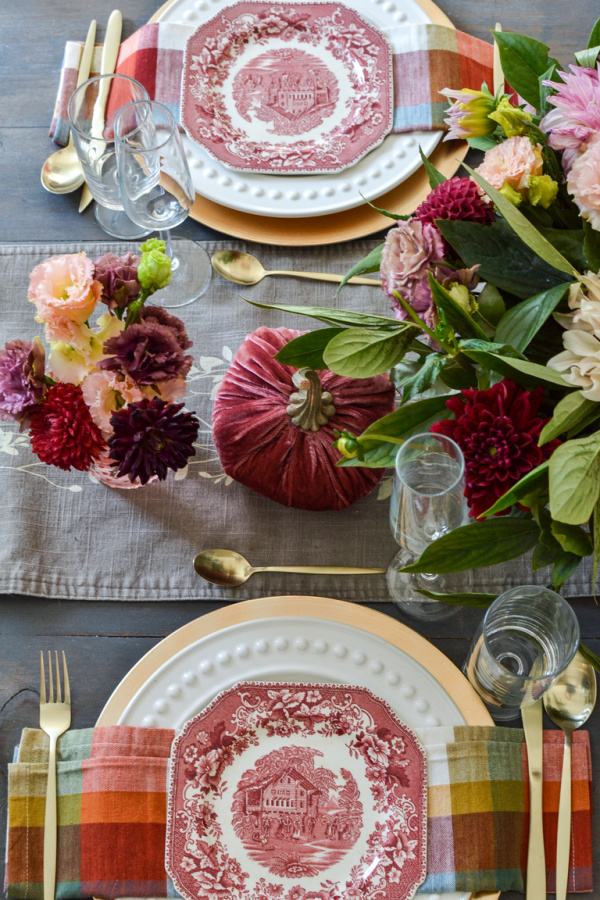 Soft pink transferware plates for a gold and pink table setting for autumn