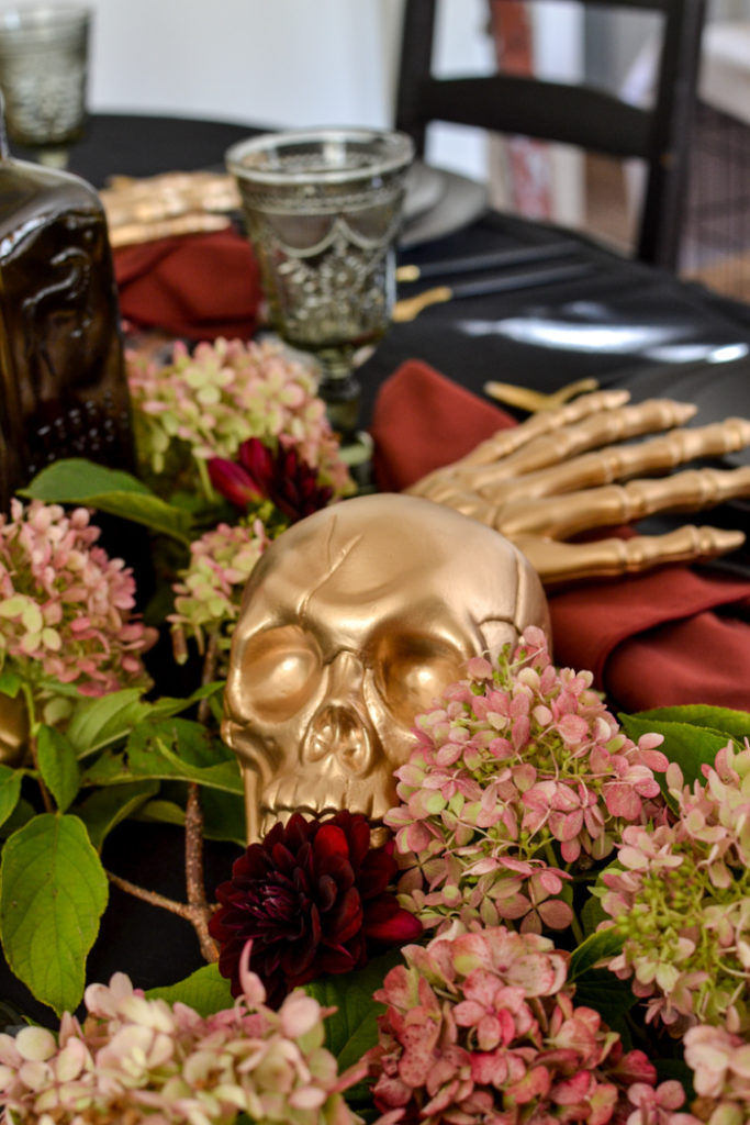 Gold skull centrepiece for a Halloween Tablescape