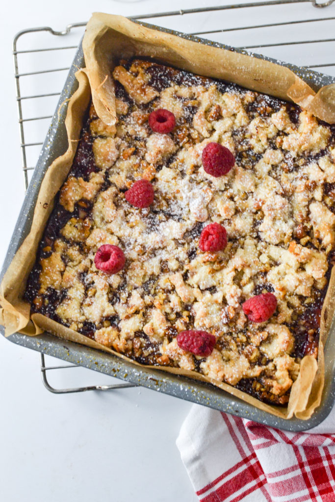 A pan of freshly baked raspberry jam squares