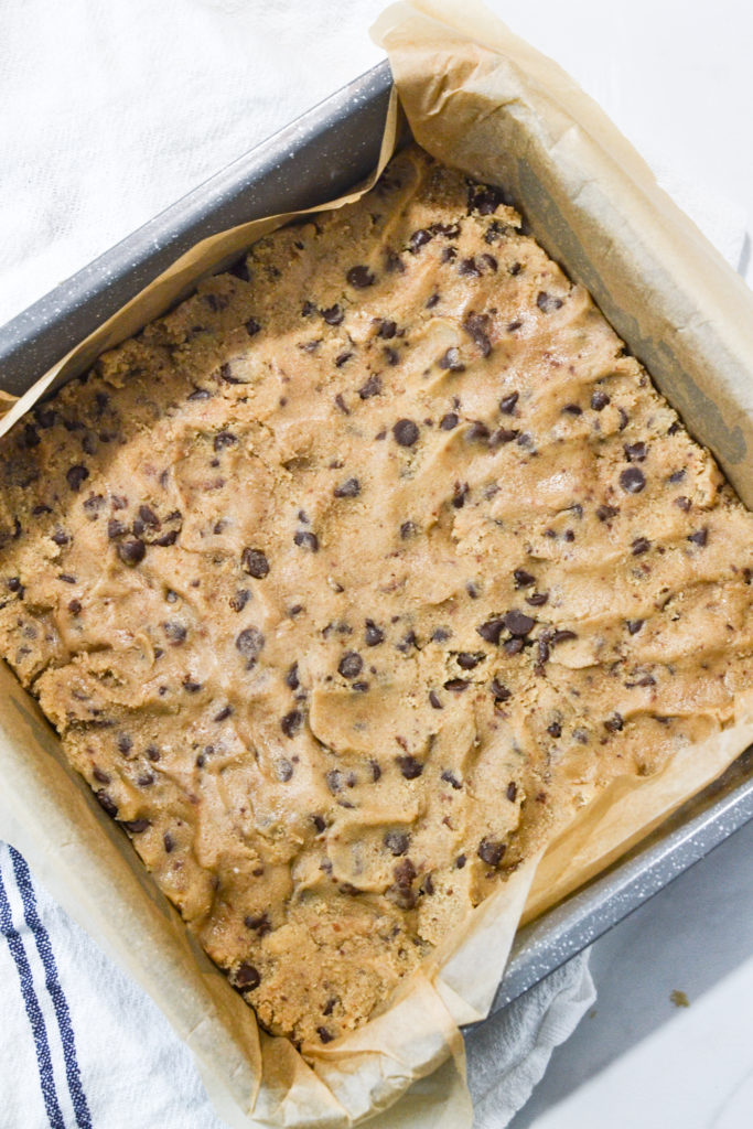 refrigerated chocolate chip cookie dough pressed into an 8 inch pan