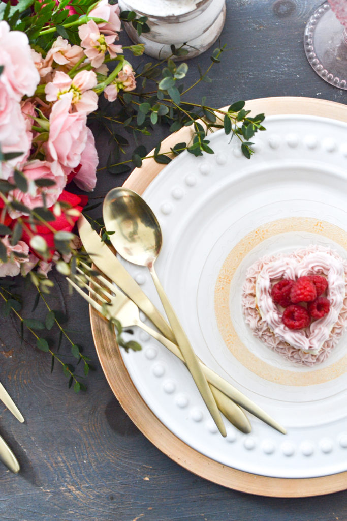 Romantic Valentine's Day tablescape with gold, pink and red