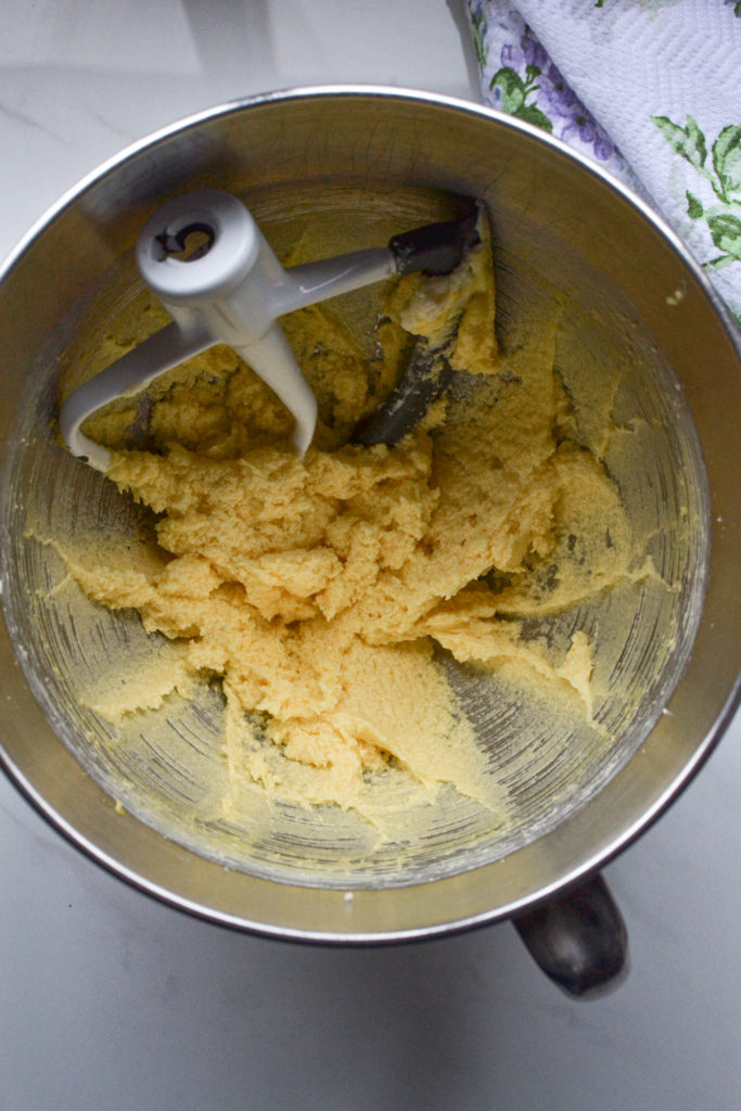 butter, egg, vanilla and sugar combined in the bowl of a stand mixer for Hummingbird cupcakes