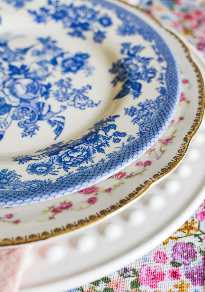 tablescape plate stack in contrasting florals