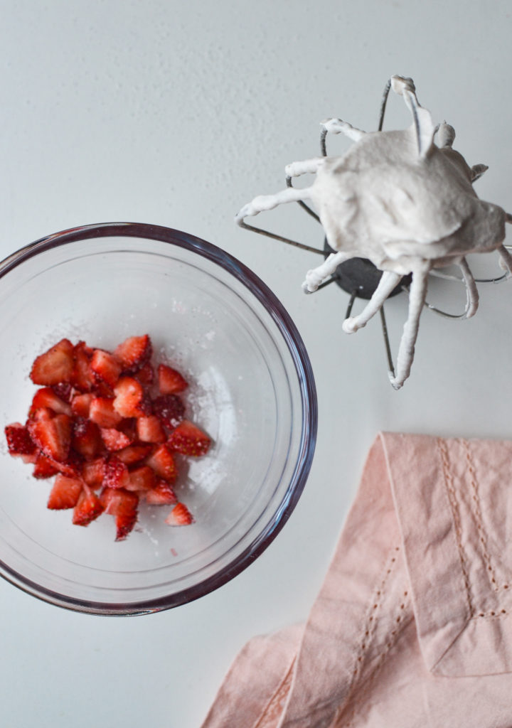 strawberries and sugar with fresh whipped cream