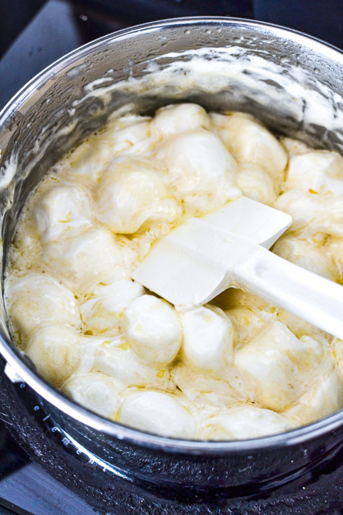 Melting marshmallows with butter to make cookies
