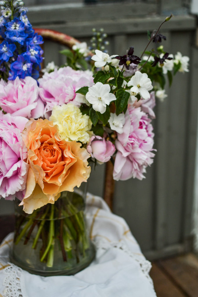 Hand Tied Bouquet made with peonies, roses and carnations