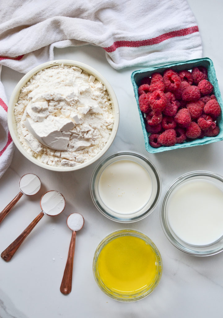 ingredients for raspberry scones measured and laid out on the counter