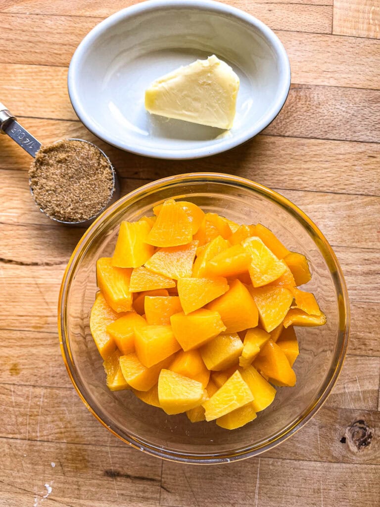 Brown sugar, butter and chopped fresh peaches to make peach sauce.