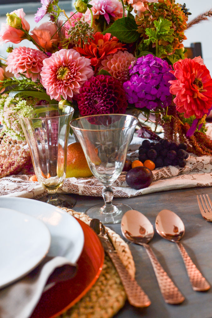 Copper flatware adds warmth and texture to a table set for fall.