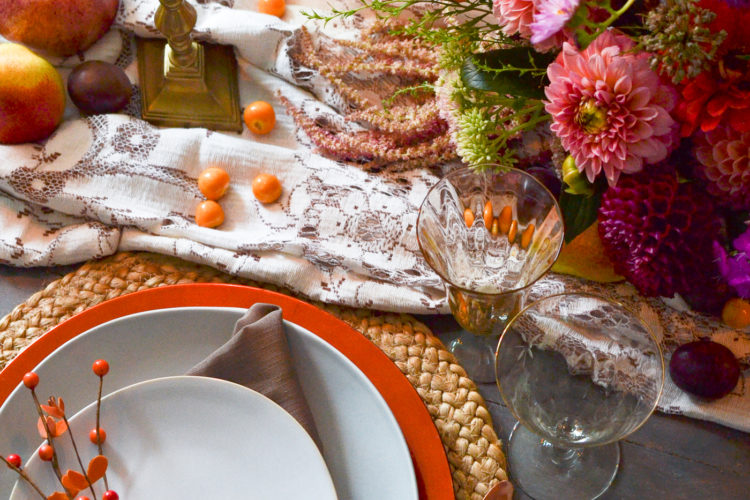 Autumn table setting in shades of blue, orange and copper
