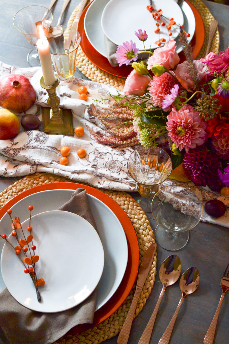 Autumn table setting in shades of blue, orange and copper