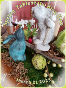 Blue Easter Bunny in a spring vignette.