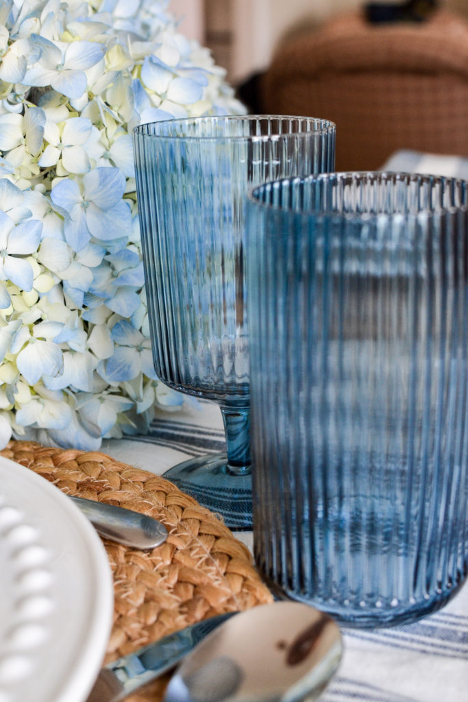 Blue wine glasses and highball glasses.