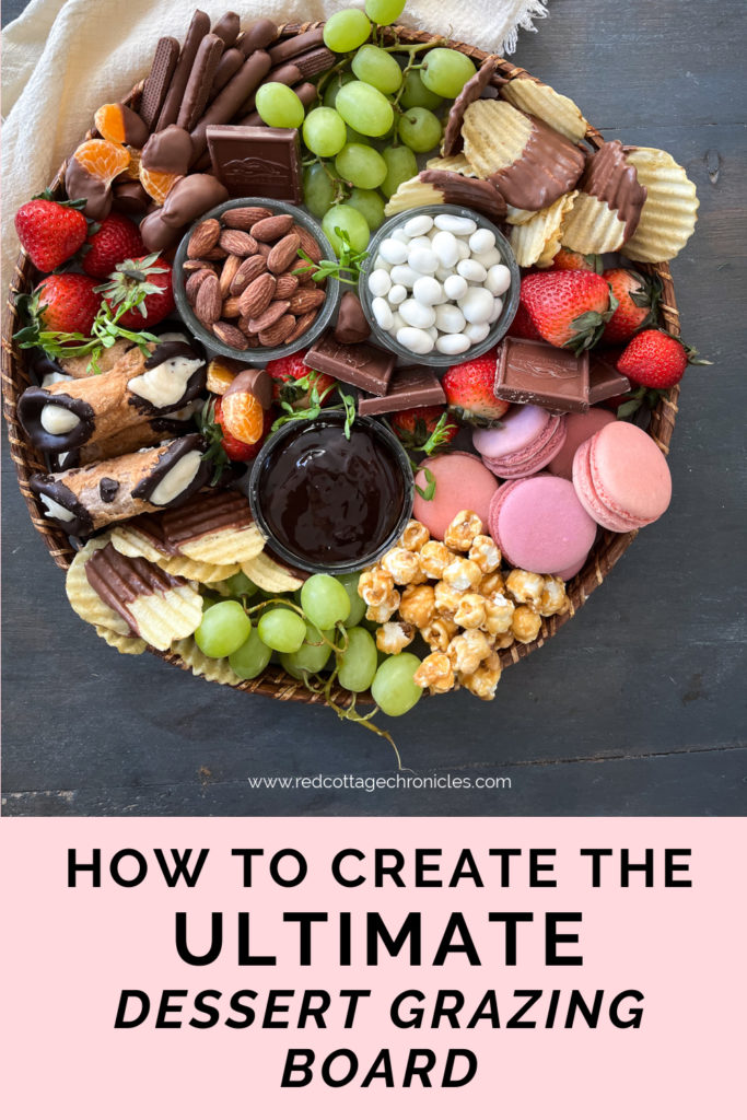 Photo for Pinterest. An overhead view of a dessert board full of fresh fruit, cookies and chocolates.