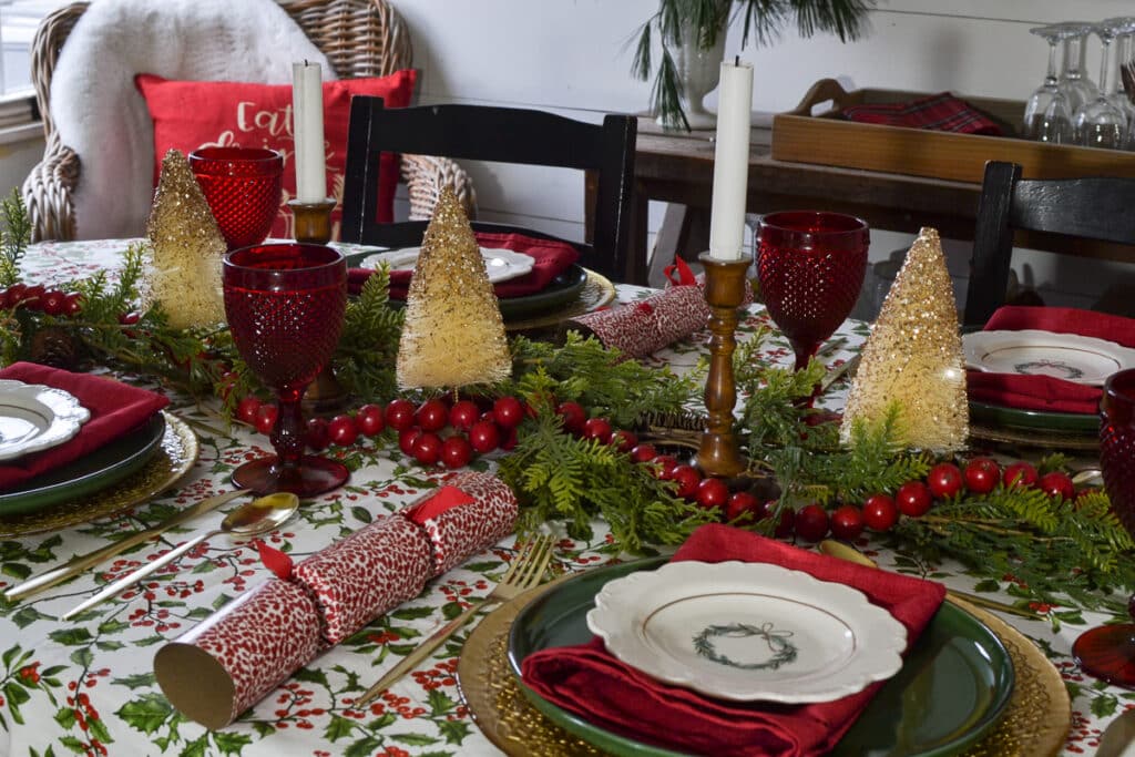 A cozy English cottage Christmas tablescape in red, green and white